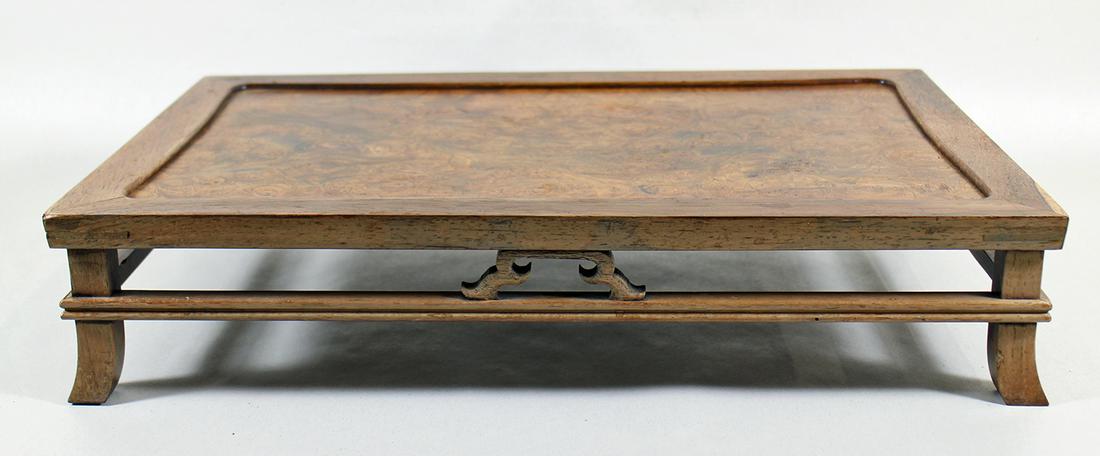 CHINESE BURLWOOD FOOTED STAND: Chinese footed wood stand or tray. Measures 11 1/2" x 17 1/2" x 3 1/2"