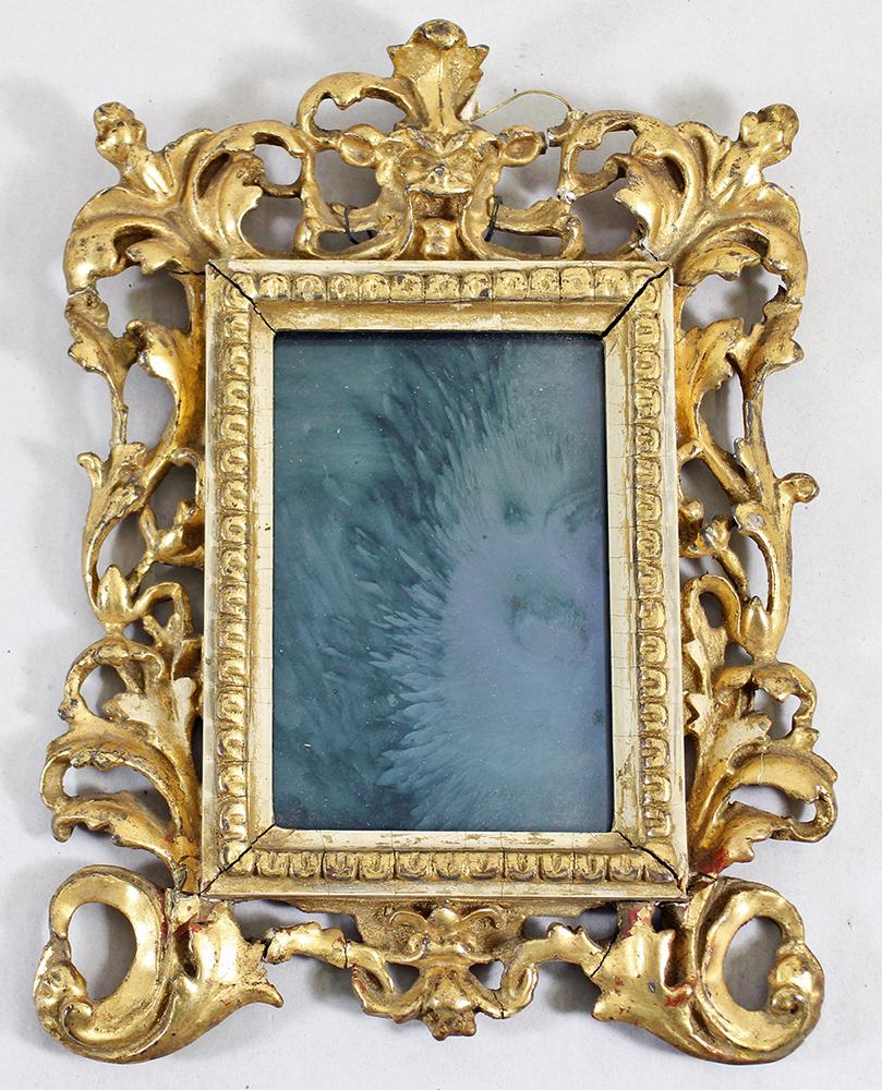 ROCOCO GILT PICTURE FRAME: Antique rococo gold gilt picture frame. Frame measures 11" x 8.5" wide, age related wear and losses.