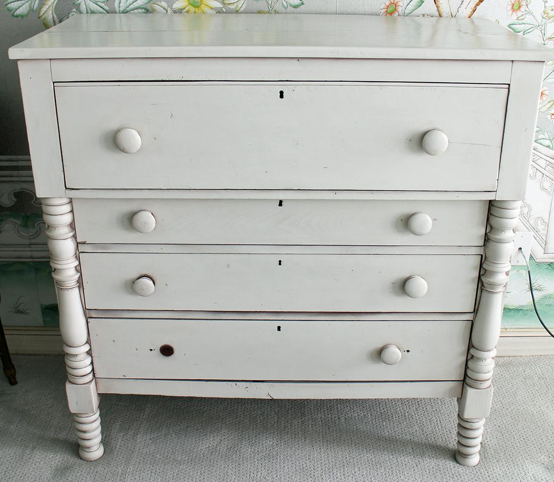 ANTIQUE PAINTED DRESSER: Antique wood dresser painted white. Knob loose but included. Measures 42.75" tall 42.5" x 19.75" wide.