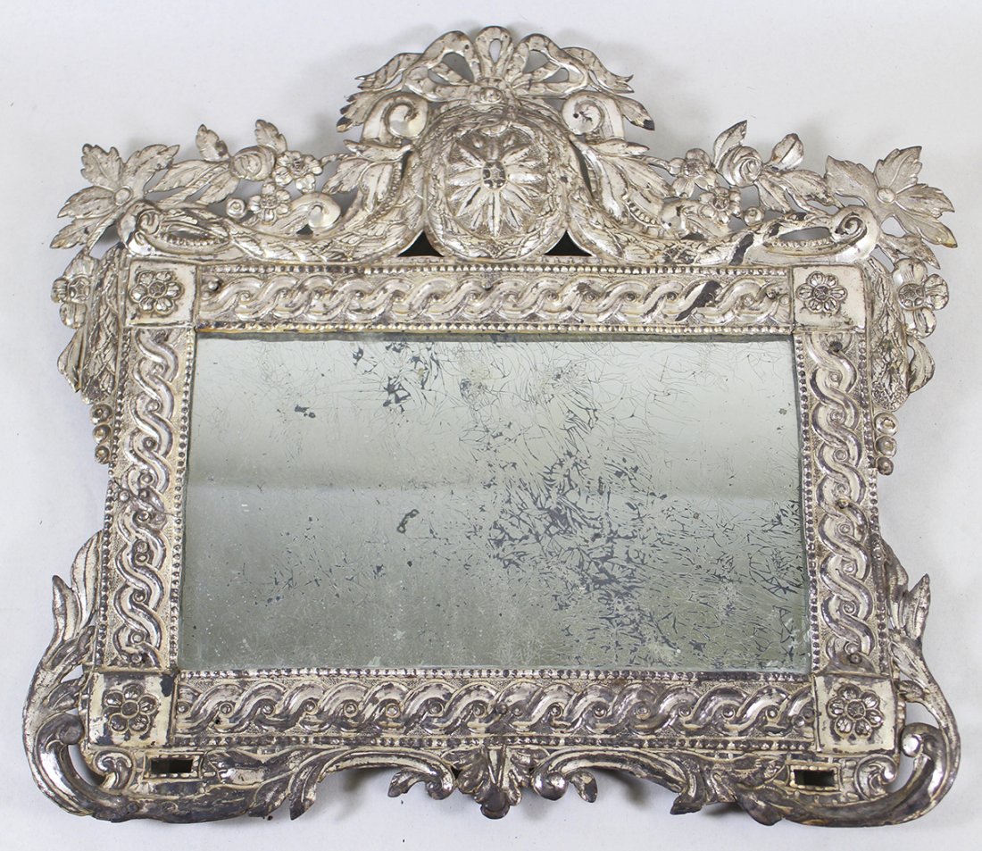 ANTIQUE SILVER GILT MIRROR: Antique silver gilt metal mirror. Measures 17" x 15.5"