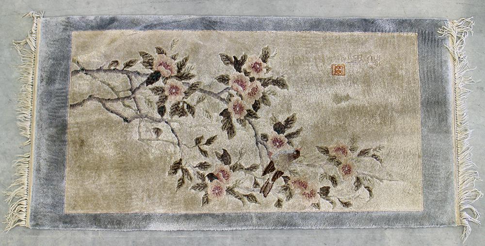 CHINESE RUG - 48" x 24": Chinese area rug with flower design. Measures 48" x 24"