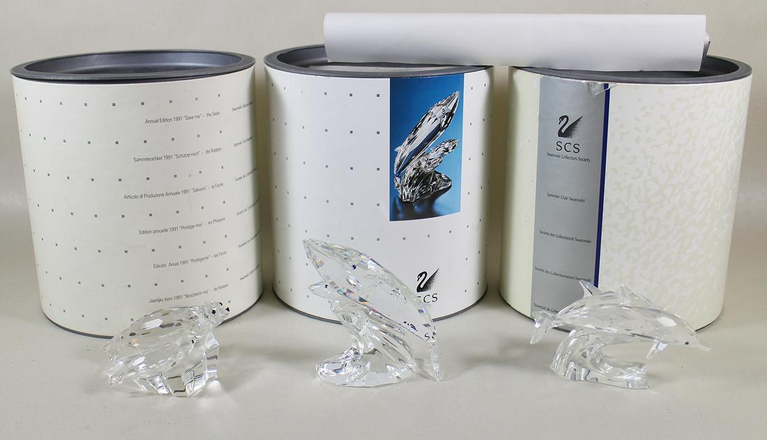 (3) SWAROVSKI SEAL, WHALE & DOLPHIN ANNUAL EDITION: A set of 3 annual edition figurines to include, "Lead me Dolphins 1990", "Care for me Whales 1992" and "Save me Seals 1991" all with original boxes.