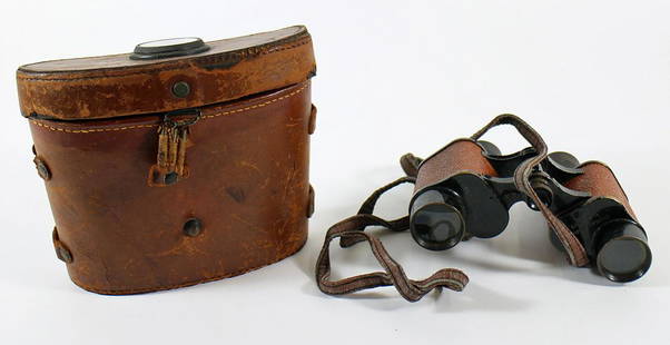 WWI US SIGNAL CORP ARMY BAUSCH LOMB BINOCULARS: A pair of US Army Signal Corp binoculars by Bausch & LombOptical Co Rochester NY from WWI / WWII. Prism Stereo 30mm APERT 6 power. Serial Number E10985. With original leather case with a Bausch &