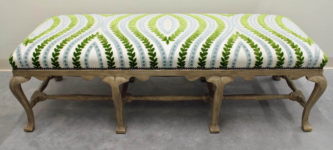 JERRY PAIR CALIFIA BENCH: Jerry Pair Califia bench with 8 legs and custom foliage upholstery and taupe with gold and silver finish. Measures 22" x 62" wide 19" tall.