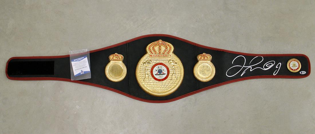 FLOYD MAYWEATHER AUTOGRAPHED WBA CHAMPIONSHIP BELT: Floyd Mayweather autographed WBA Championship boxing belt (some losses to stones). Beckett COA. Belt measures 49" wide.