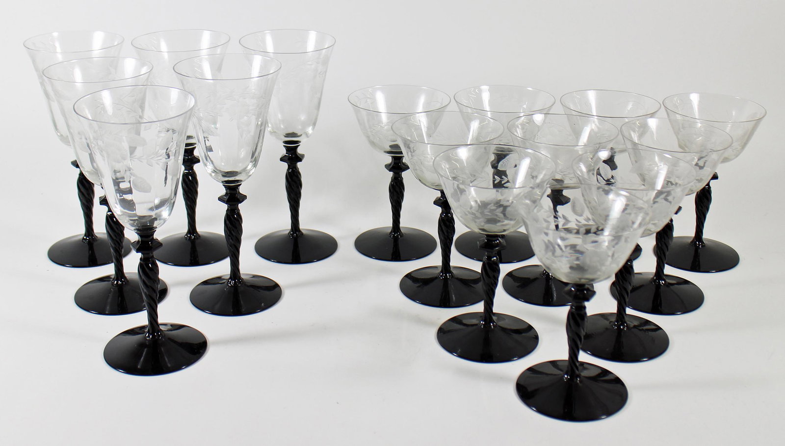 (16) VINTAGE ETCHED BLACK TWIST STEM WINE GLASSES: A set of 10 wine / sherbet glasses (5 3/4") and 6 wine / champagne glasses (8")