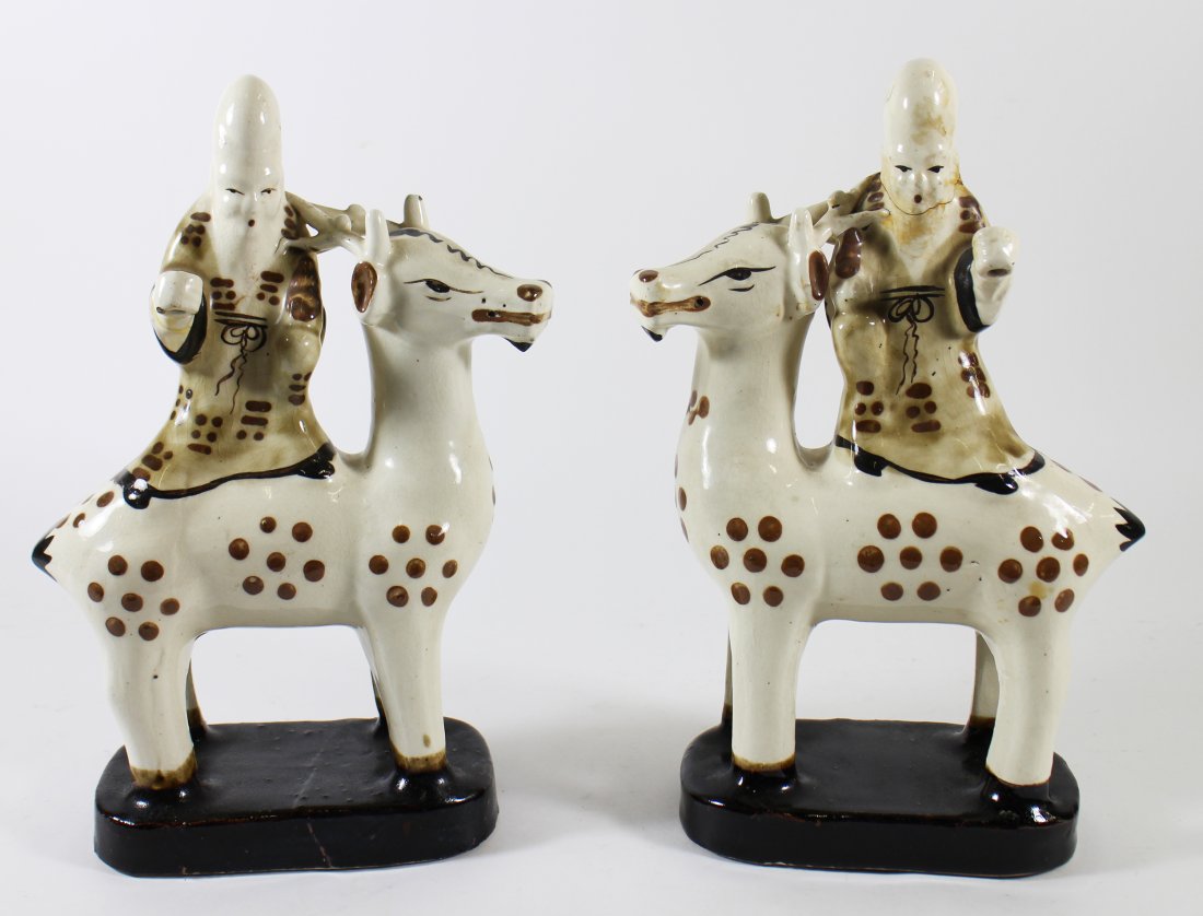 PAIR OF CHINESE POTTERY IMMORTALS RIDING ON A DEER (1 of 4)