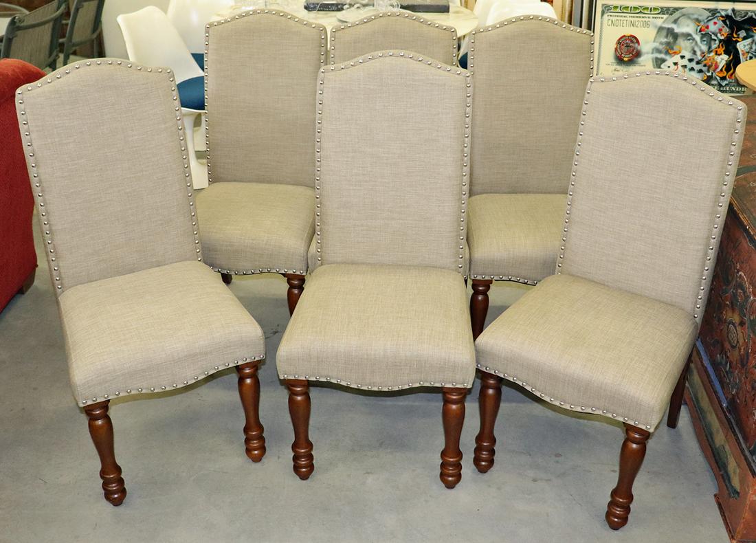 (6) UPHOLSTERED DINING CHAIRS: Set of (6) studded upholstered dining chairs. Chairs measure 19" x 20" wide 40.5" tall.