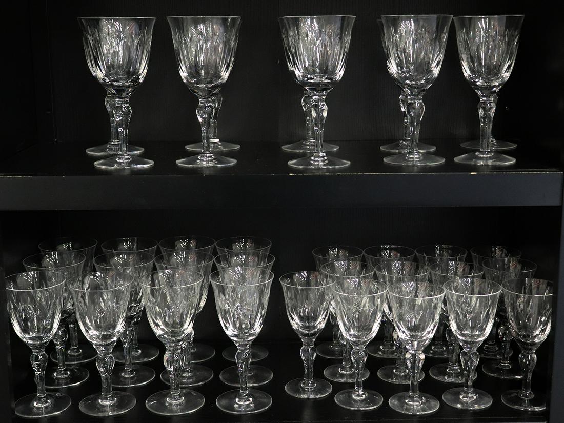 35 PC STUART CRYSTAL WINE STEM GLASSES: A set of Stuart English crystal wine glasses to include 12 red wine glasses (2 rim nicks), 10 water glasses and 13 white wine glasses.