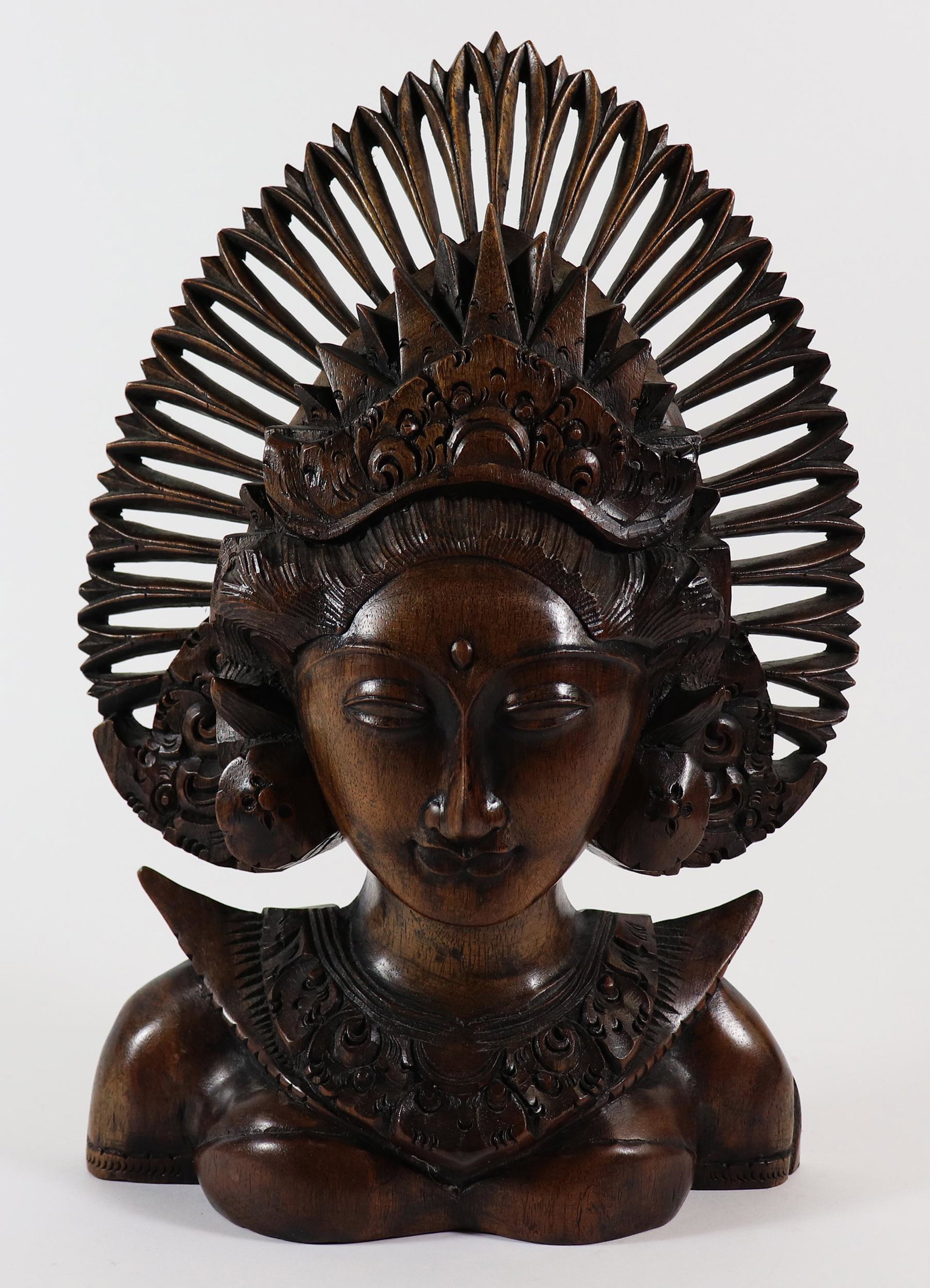 CARVED WOOD INDONESIAN BUST: Very detailed carving bust of of Bali dancer. Measures 13" T x 9" W x 3"D.