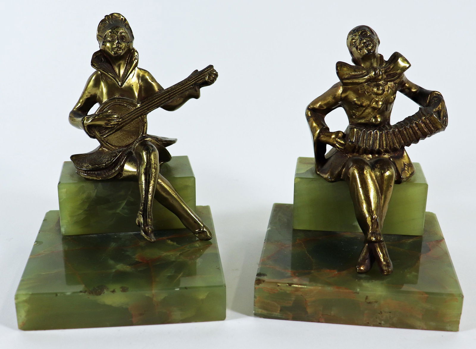 (2) ART DECO STYLE MUSICIAN BOOKENDS: Pair of Art Deco style musician bookends. Some chips. 6" tall 4" wide