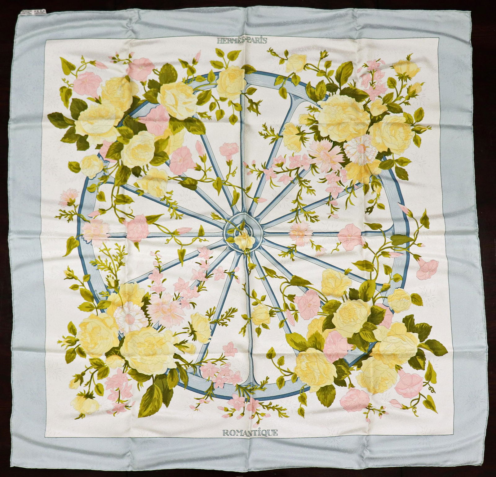 HERMES ROMANTIQUE SILK SCARF: A Hermes silk scarf by Maurice Tranchant. Approx 35" with original box.