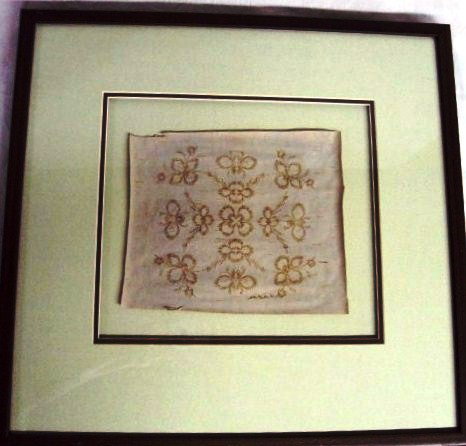 Birch Bark Biting - Framed: This biting is an original work of art. It was made by woodland Cree Native Sally Milne. After the biting is created, it is painstakingly copied into a moose hide with a feather quill and animal blood