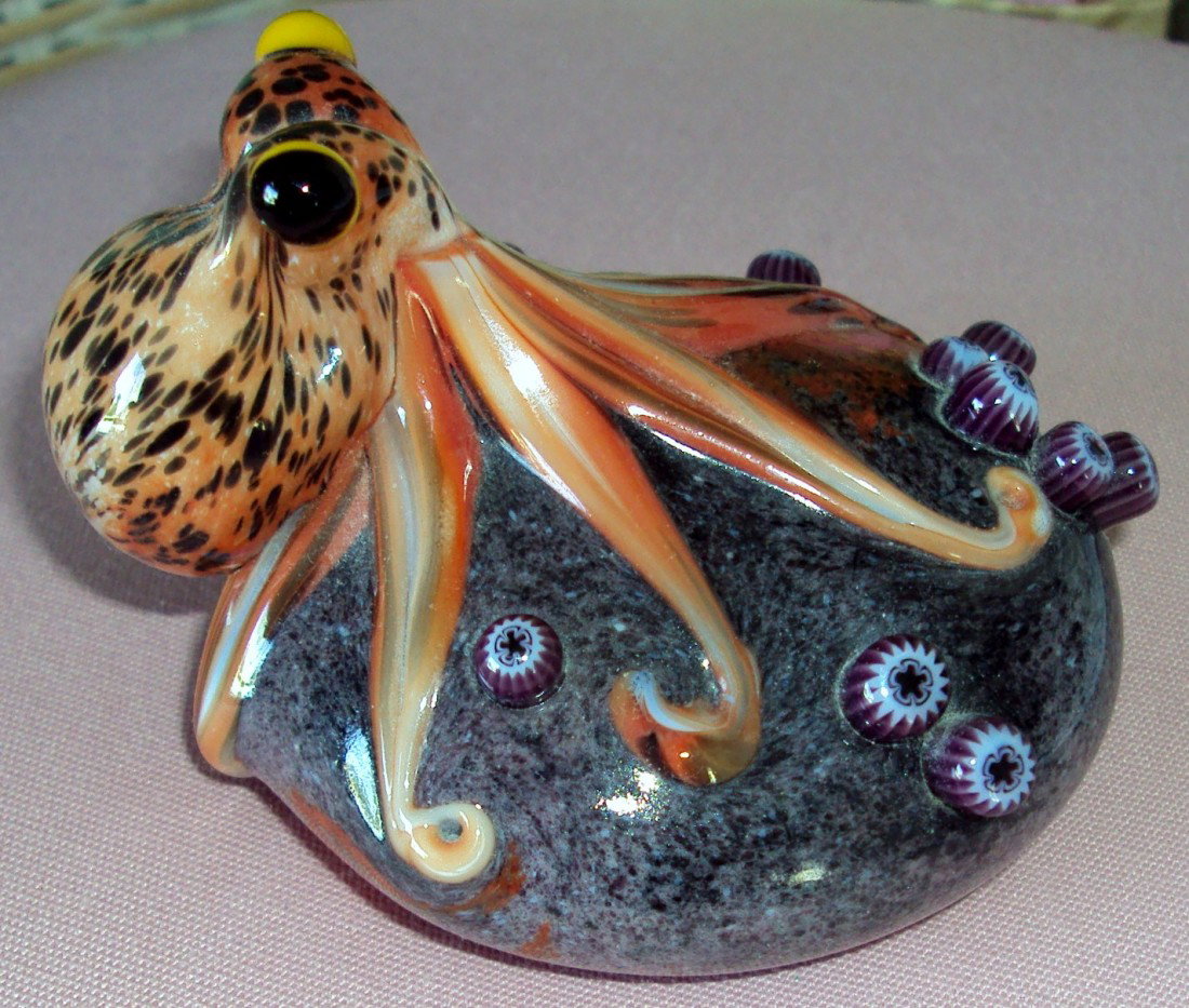 Octopus Art Glass by Dave Smallhouse: This Red Octopus was created by retired Orient and Flume artist David Smallhouse. It sits on a rock surrounded by sea anemone, This weight is from the Studio Collection and is numbered 62/500 edition,