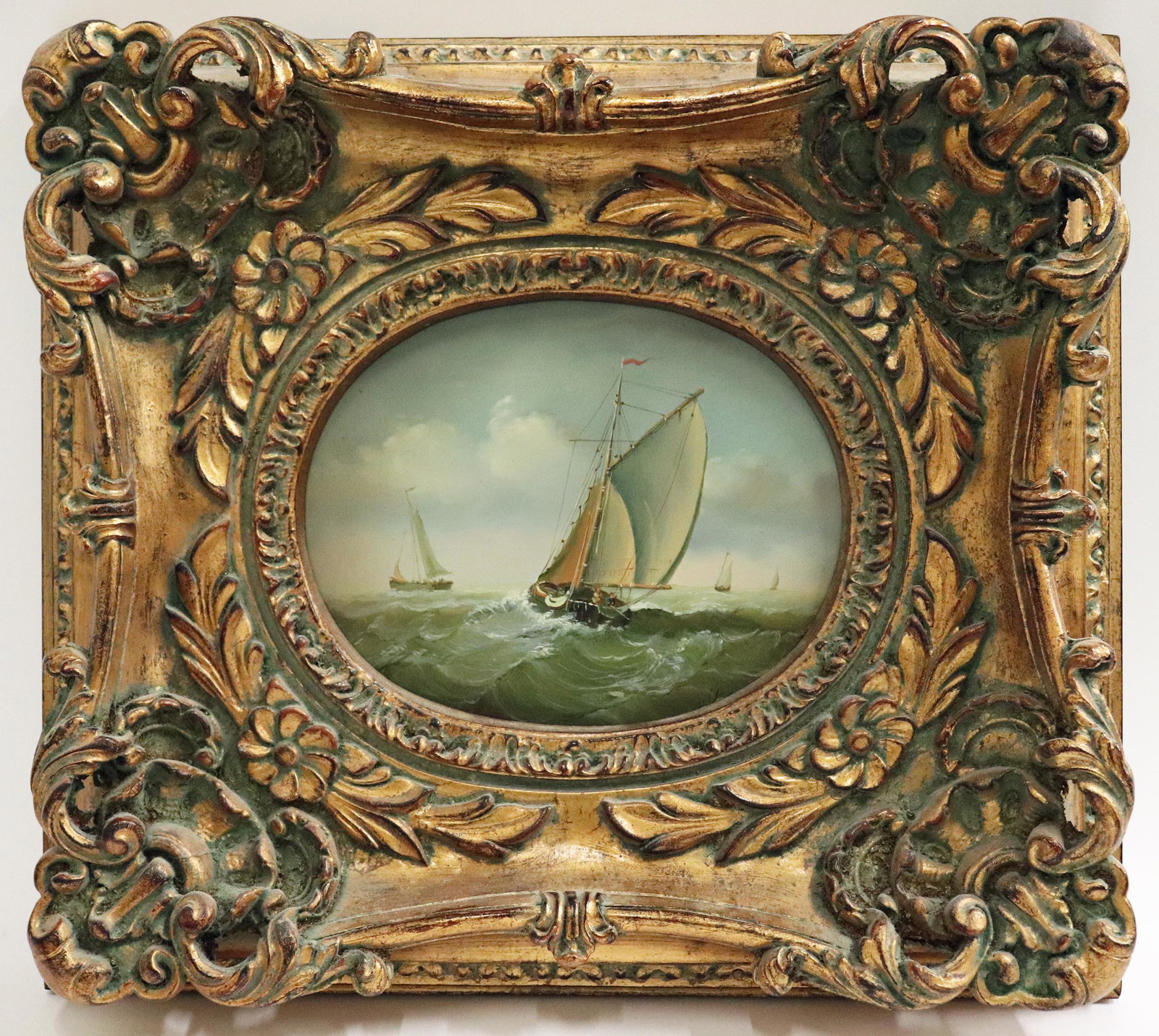SEASCAPE PAINTING IN ORNATE FRAME: Seascape painting on board with sailboats in a ornate gold frame. Measures 10" x 8" and 18.5" x 16.5" w/ frame
