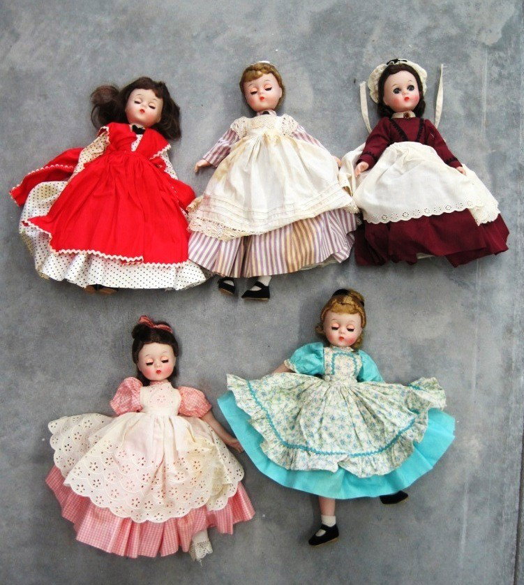 Vintage Madame Alexander Dolls: 11" Tall. Beth, Meg, Jo, Marme, & 1 Unknown. Some of the arms, legs, and heads need to be attached. All original dresses with tags.