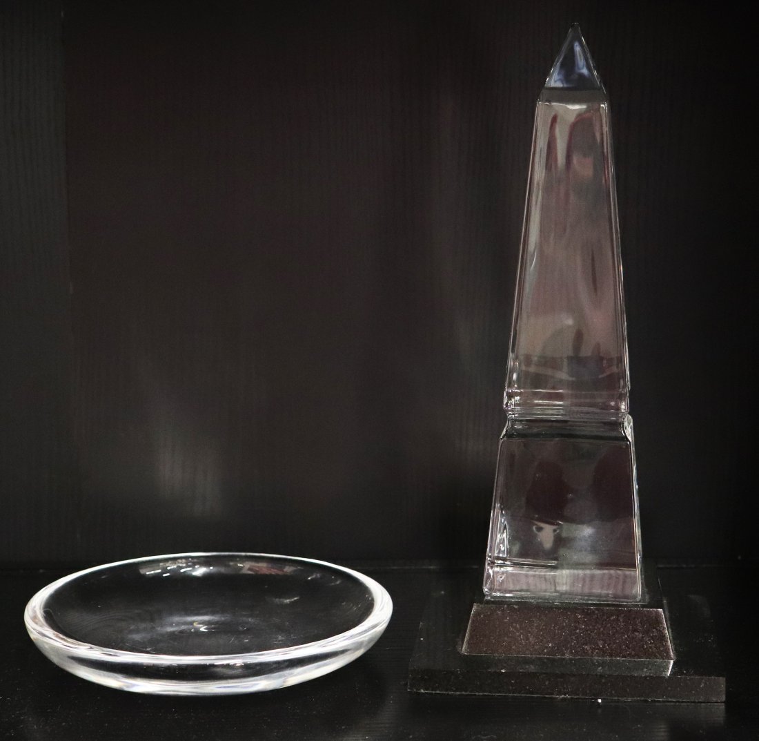 STEUBEN CRYSTAL OBELISK & BOWL: Steuben 9" tall obelisk sculpture with stand (small fleabite to bottom edge) and a 6" bowl (some scratches). Both signed.