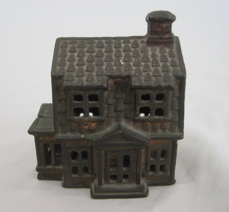 A.C. Williams Colonial House Cast Iron Still Bank: Early 20th Century.