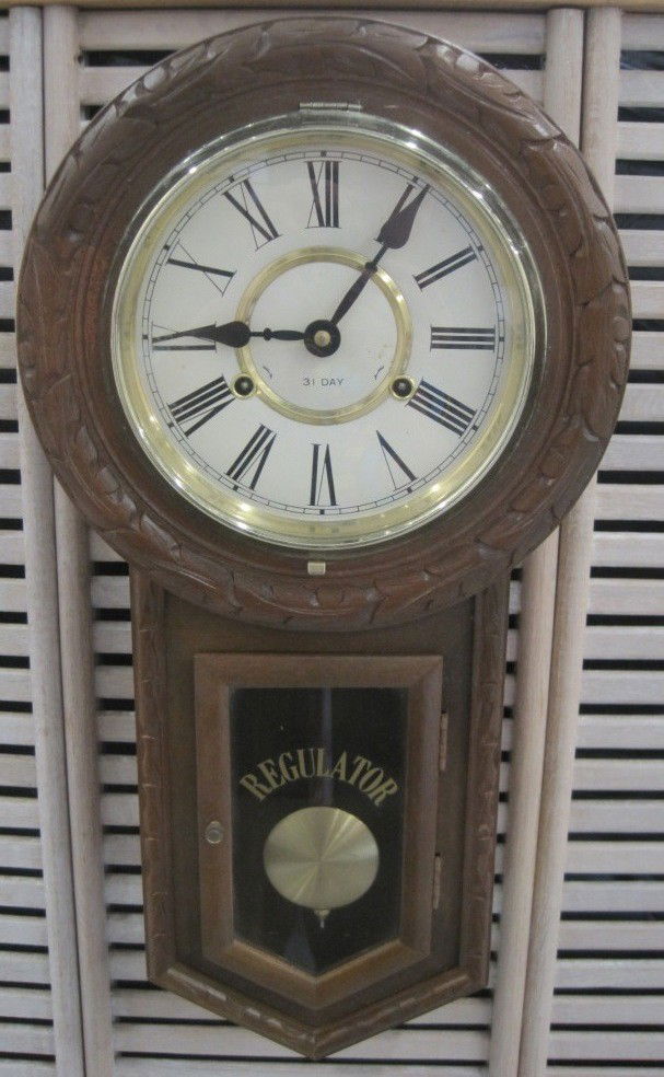 Regulator 31 Day Wall Clock: 23 1/2" Long.
