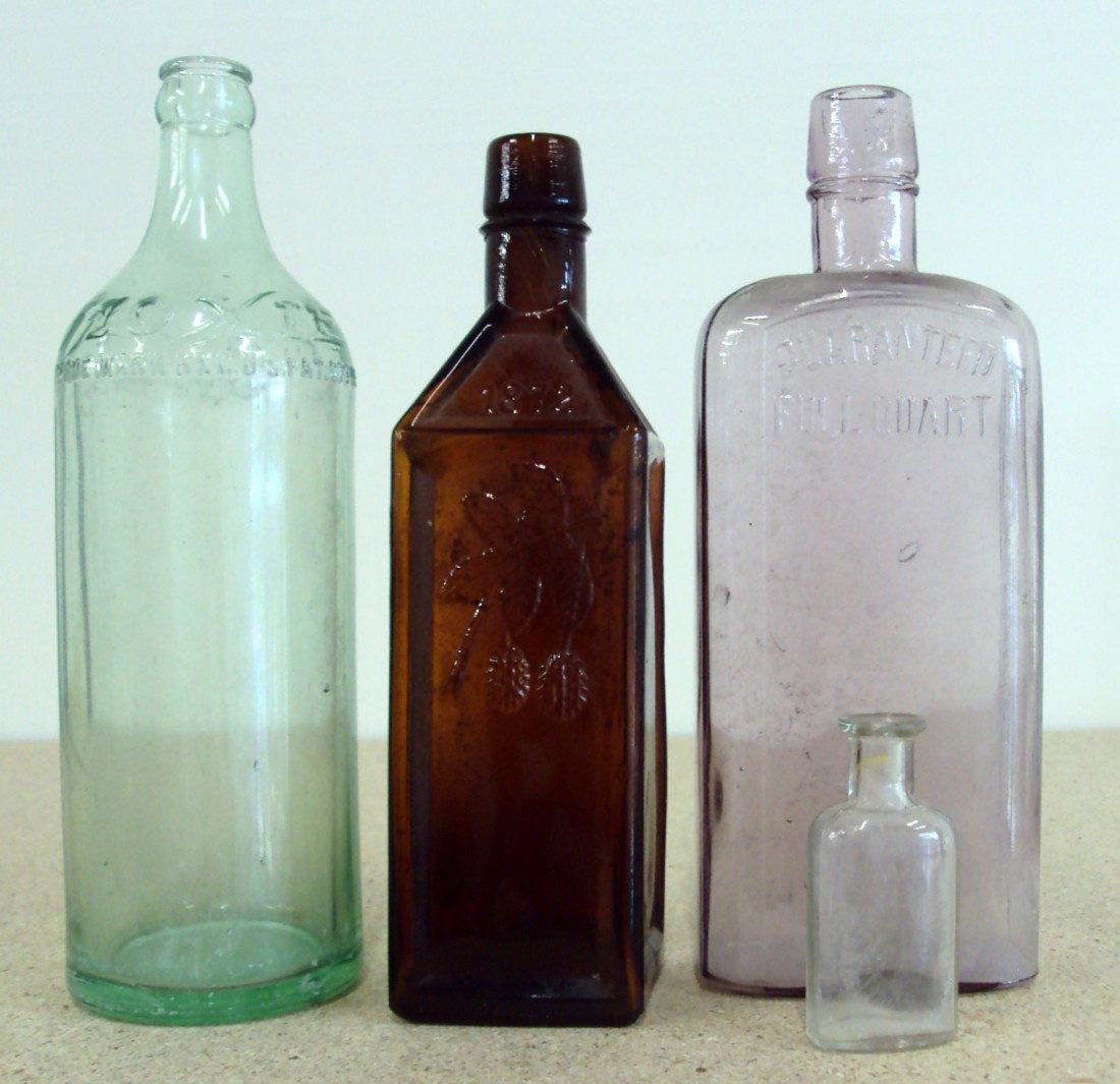 (4) Antique Bottles Doyles Bitters & More: Moxie & Whiskey Quart.