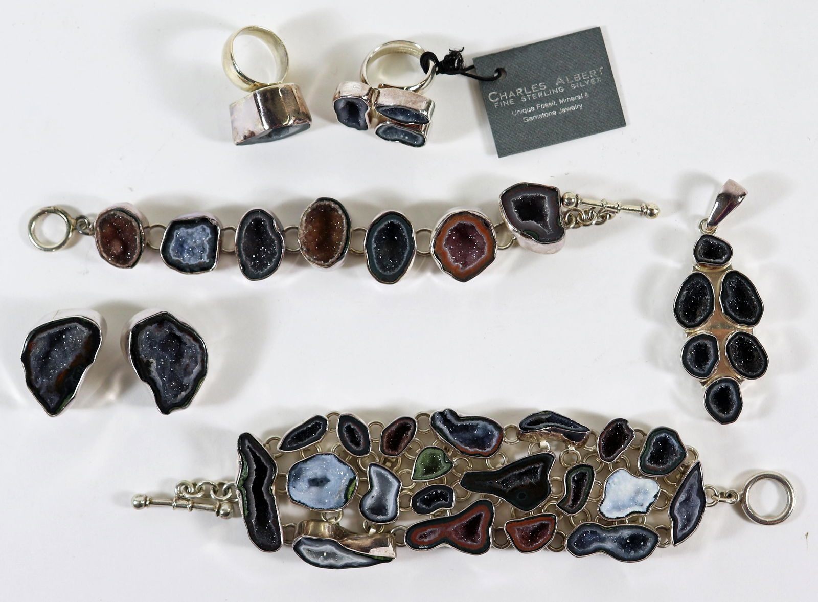 CHARLES ALBERT STERLING SILVER GEODE JEWELRY: Includes 2 bracelets, 2 rings, a pendant and a pair of earrings. Charles Albert jewelry is made of natural stones and can include Kyanite, Ammonite, Shark tooth, Geode, Pearl, Agate, Lapis, Jasper, Ci