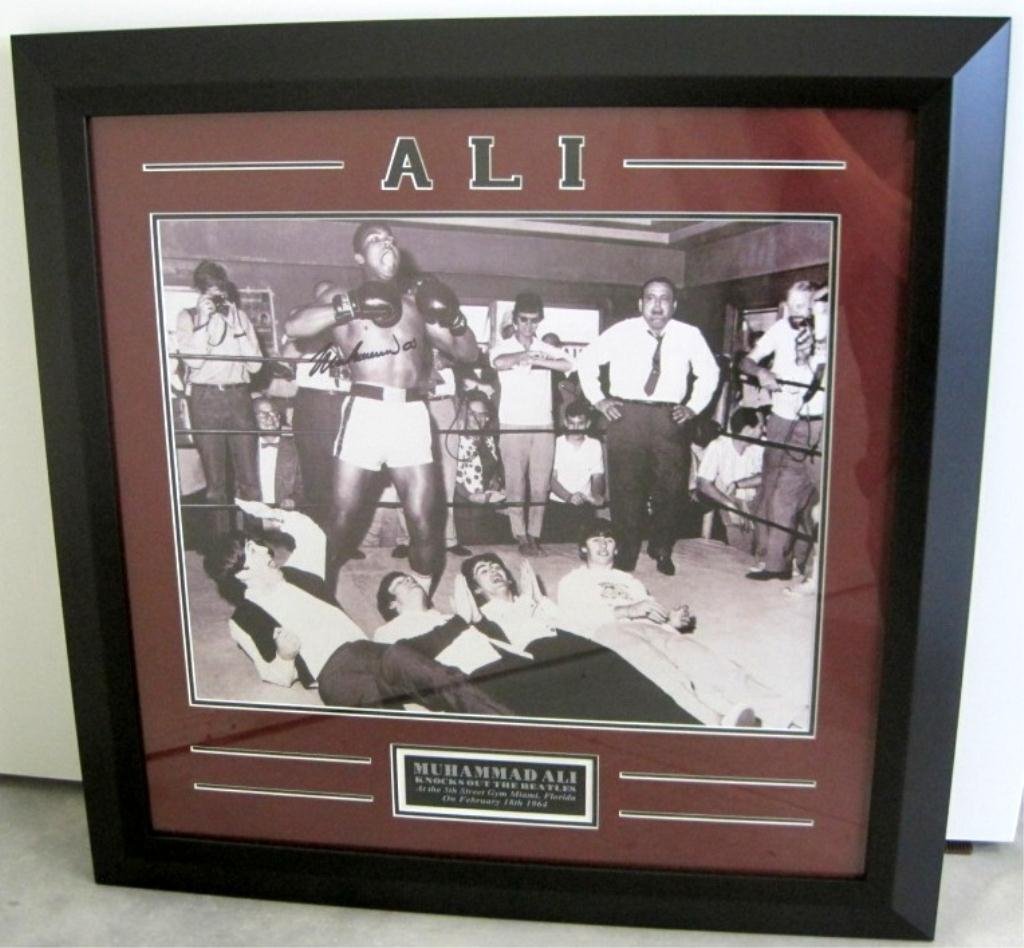 MUHAMMAD ALI SIGNED BEATLES PHOTO W/ COA: 15 1/2" X 19 1/2" IN FRAME.