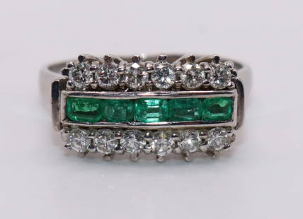 18K WHITE GOLD EMERALD & DIAMOND RING: 18KT white gold ring with (5) emerald cut emeralds and (12) round diamonds H, VS. Size 6 1/4. Weight 2.3 DWT.