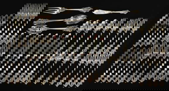 WALLACE GRANDE BAROQUE STERLING FLATWARE FOR 8: Wallace Grand Baroque sterling silver flatware set for 8 including (8) knives, (8) forks, (8) salad forks, (8) butter spreaders, (8) teaspoons (one with some damage), (3) serving pieces, and master bu