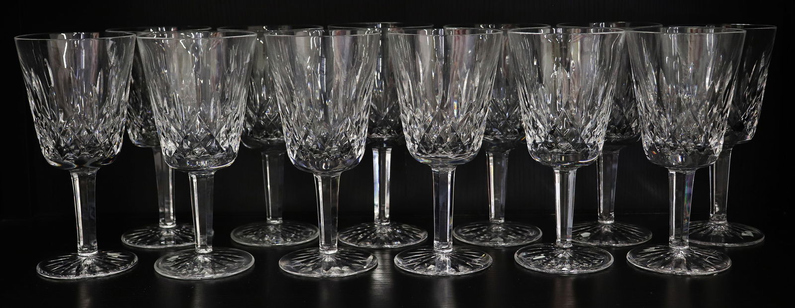 (12) WATEFORD CRYSTAL LISMORE GOBLETS: Set of (12) Waterford Crystal Lismore pattern water (or wine) goblet glasses. 6 7/8" tall.