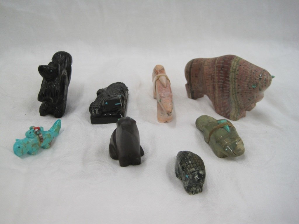 (8) ZUNI FETISHES: Turquoise & stone. Buffalo has one horn missing. Squirrel Signed Gilbert Lopez.