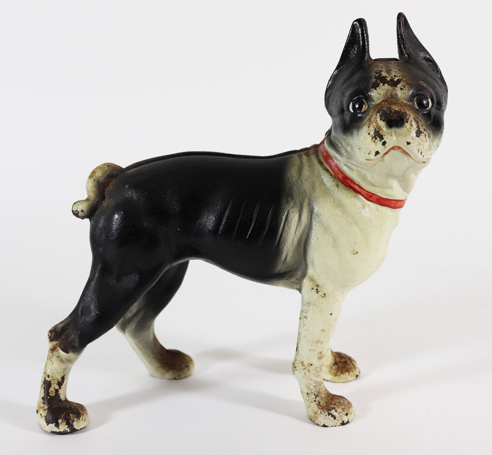 ANTIQUE BOSTON TERRIER DOG CAST IRON DOORSTOP: Cast iron door stop of a painted Boston Terrier. Measures 9 1/2" x 9 1/2"
