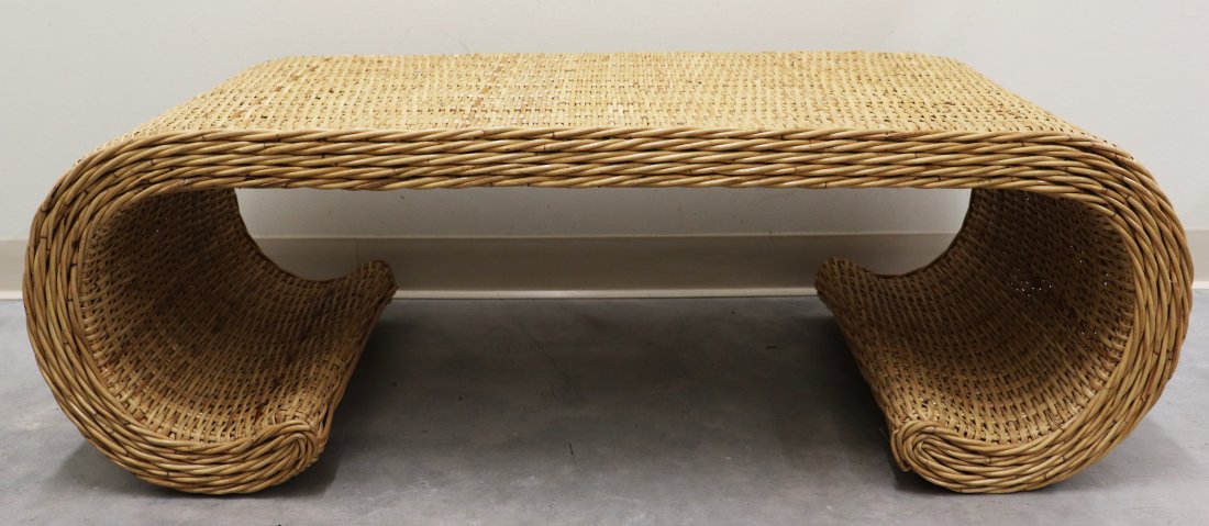 WICKER SCROLL TABLE: Wicker scroll coffee table. Measures 20.25" x 40" wide 16" tall.