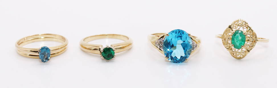 (4) 14K GOLD GEMSTONE RINGS: Collection of (4) 14K yellow gold rings to include blue topaz and emerald stones. The rings range in size from 6 to 7 1/2. Weight 12.9 grams.