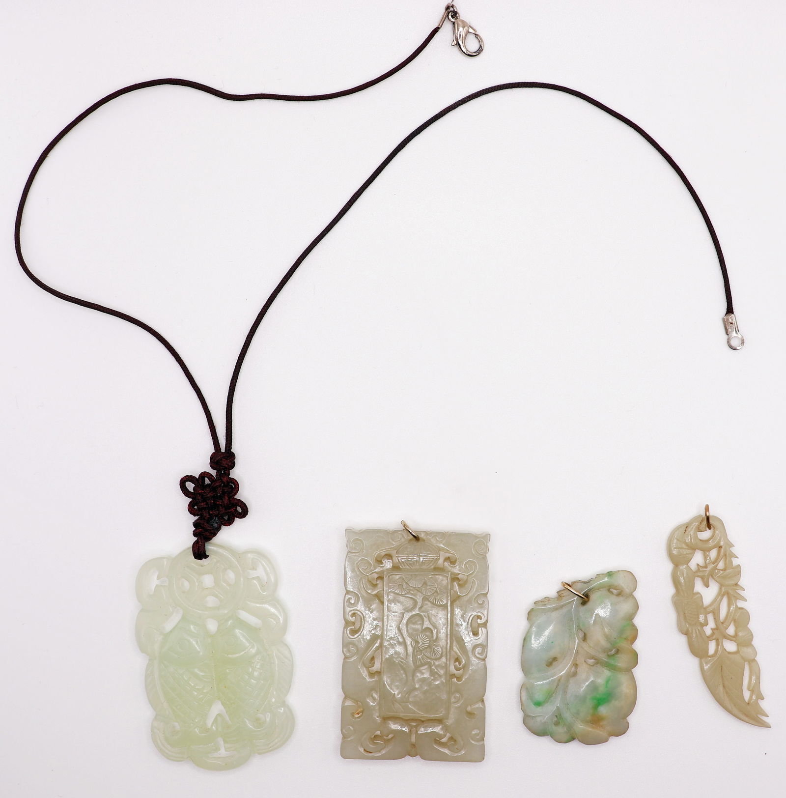 (4) CHINESE PIERCED JADE PENDANTS (1 of 4)