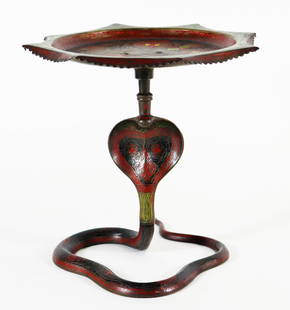 ANGLO INDIAN COBRA SNAKE CHARMER TAZZA: Enameled brass compote with a cobra snake coiling around the base. The bowl has a peacock and flower motif. It stands 8" tall x 8 1/4" wide.