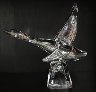 STEUBEN WATER BIRD CRYSTAL FIGURINE: Steuben crystal water bird sculpture. Signed on bottom. Includes Steuben pouch. Measures 10.75" wide 10" tall.