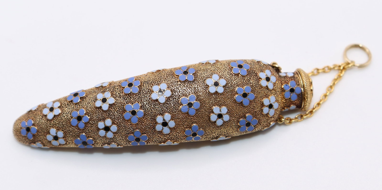 ANTIQUE 14K GOLD ENAMEL FLOWER SCENT BOTTLE: A 14K yellow gold snuff bottle chatelaine with light & dark blue enamel flowers. 2 1/2" long. Weight 11 g (7 DWT)