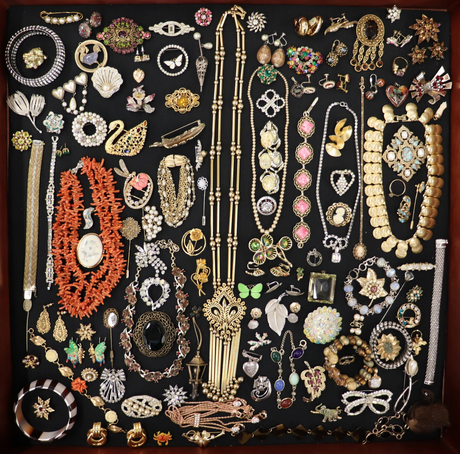 COLLECTION OF VINTAGE JEWELRY OVER 100 PIECES: This beautiful collection includes necklaces, brooches, earrings, bracelets, and more with pieces by Swarovski, Goldette, Vandome, Florenzna, Kramer, Pennino, Sarah Coventry, Mimi, Cino, Trifari, Coro
