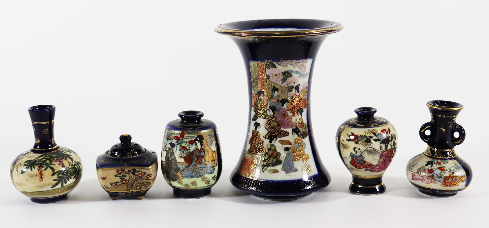 MINIATURE JAPANESE BLUE & GOLD SATSUMA VASES: A collection of mini Japanese vases that range in size from 1 1/2" to 4 1/4". Some are signed.