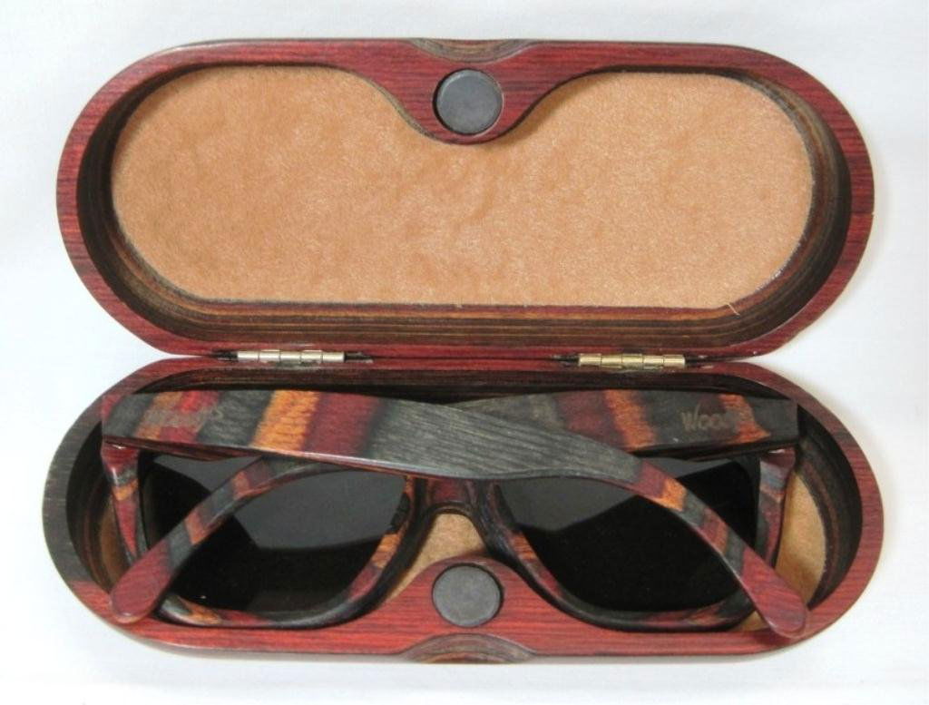 WOODY'S SUNGLASSES AND CASE: The inside of the glasses is marked USA C9409080317 and Original.