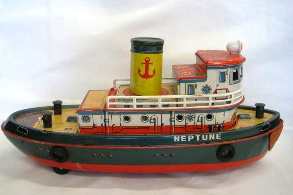 VINTAGE NEPTUNE TIN TUG BOAT