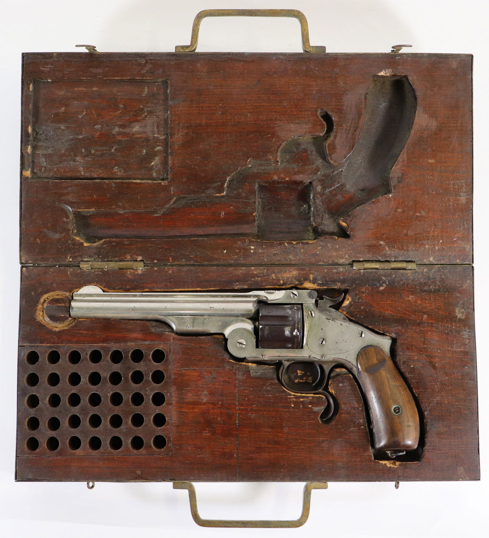 SMITH & WESSON RUSSIAN MODEL 3 REVOLVER WITH BOX: A rare antique 44 gauge Smith and Wesson caliber revolver with Lanyard ring mounted in the butt, smooth Walnut grips. Barrel rib is marked "SMITH & WESSON SPRINGFIELD MASS, U.S.A. PAT, JULY 10.60.JAN