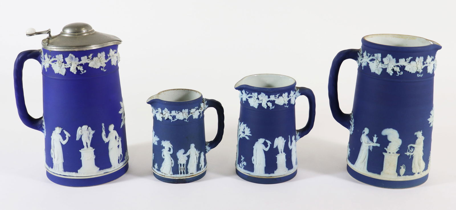 (4) BLUE WEDGWOOD JASPERWARE TROJAN JUGS (1 of 5)
