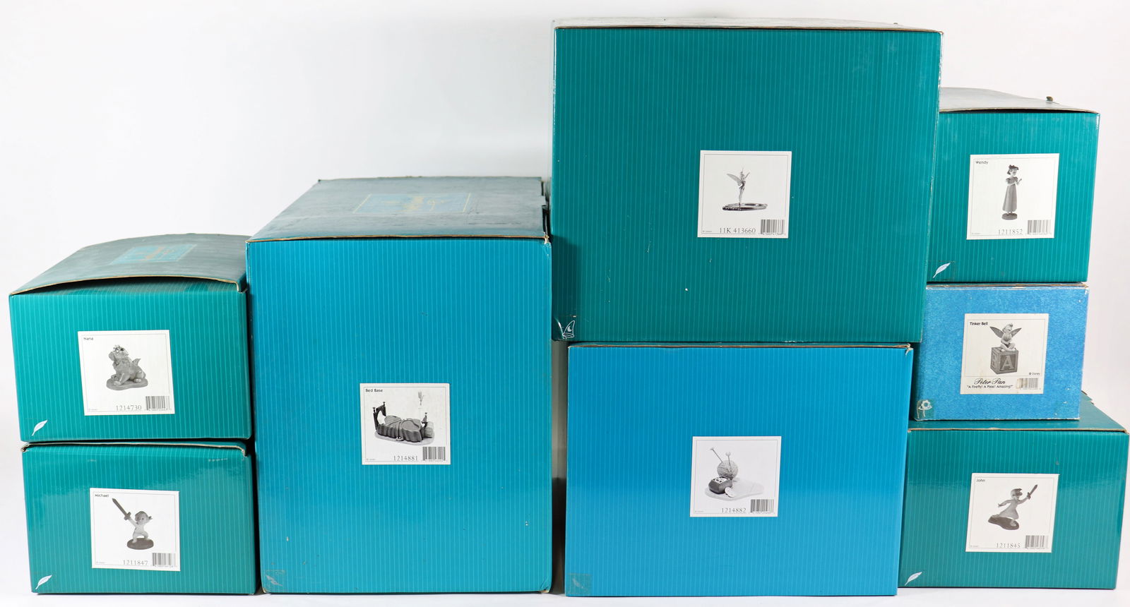 (8) WALT DISNEY PETER PAN BOXED COLLECTIBLES (1 of 1)