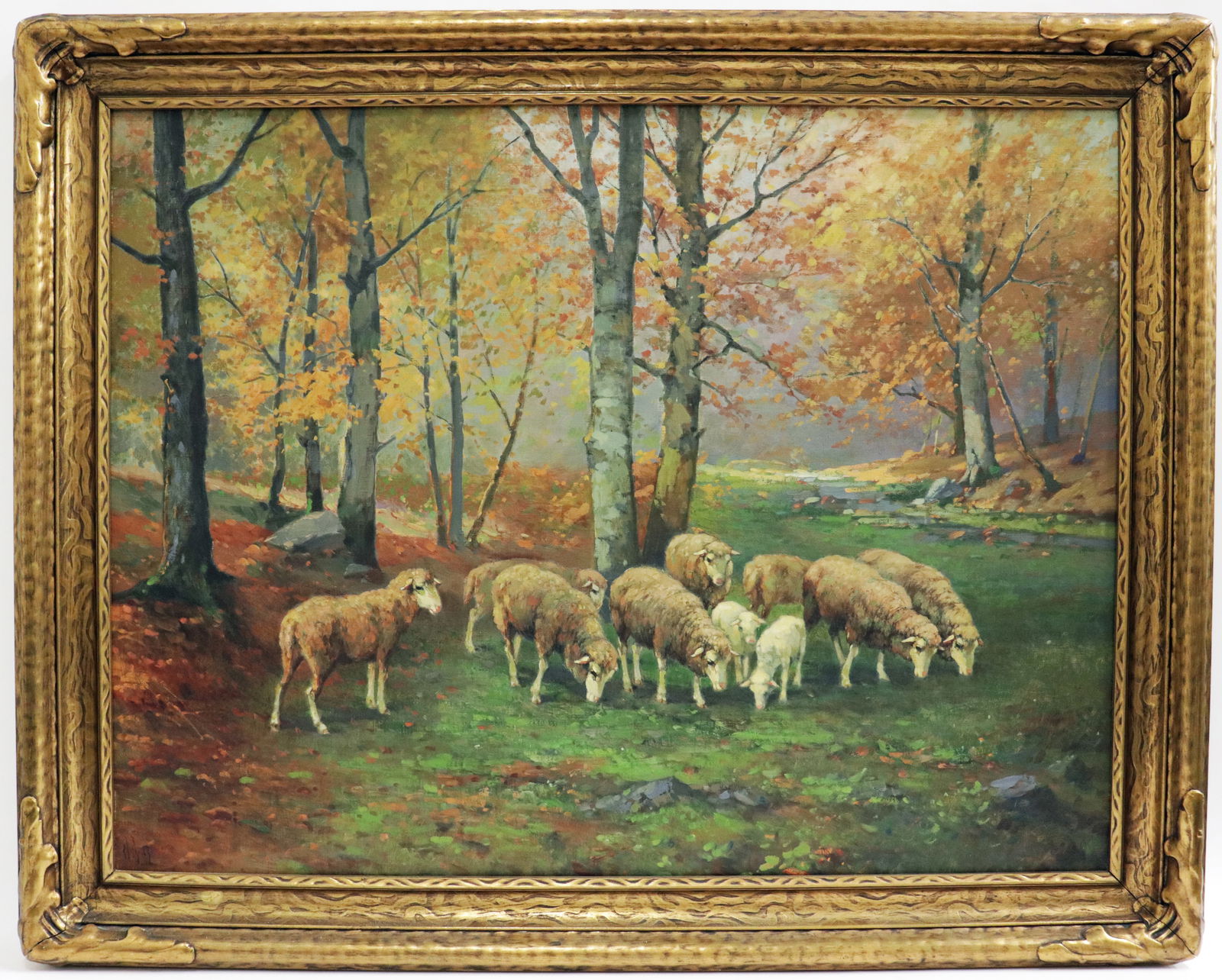 ANTIQUE PASTORAL LANDSCAPE PAINTING: A 19th century oil on canvas painting of a flock of sheep feeding in the valley. Signed lower left. Framed in a Newcomb Macklin (?) wood frame. Measures approximately 34" x 26" and 39.75" x 31.5" w/ f