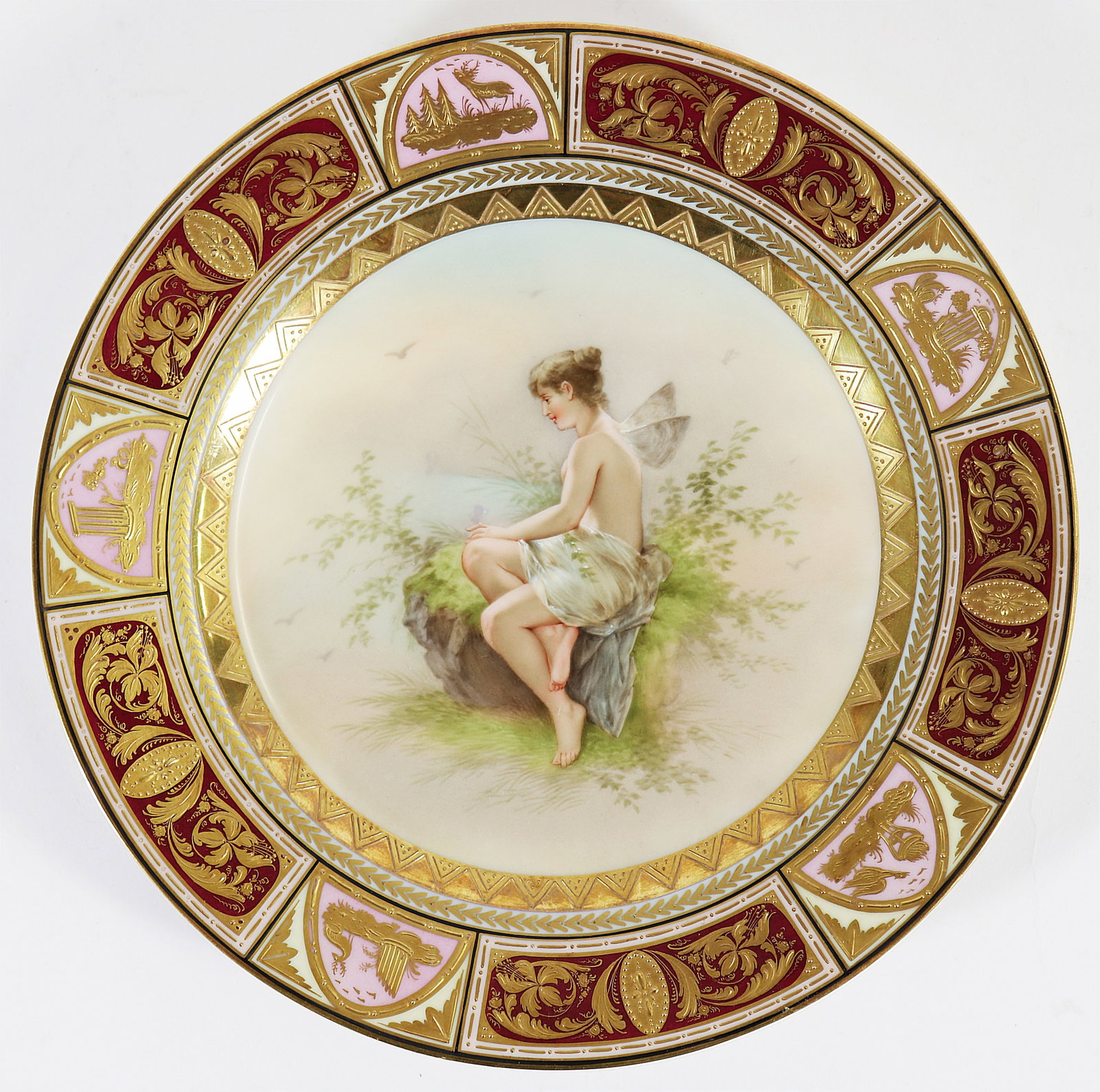 ROYAL VIENNA "PSYCHE" PAINTED PLATE 14253: Royal Vienna classical design plate with a semi nude winged female figure. # 14253 with blue beehive mark on underside. Measures 9.5" wide.