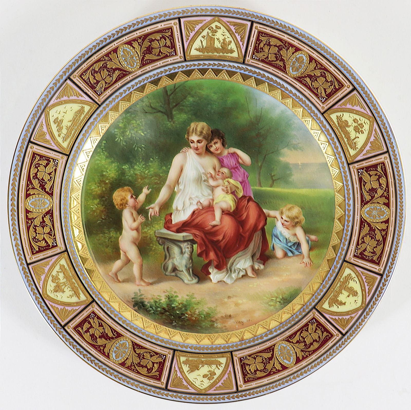 ROYAL VIENNA MOTHER & CHILDREN PAINTED PLATE 13892: Royal Vienna classical design plate with a mother sitting on a bench breast feeding with her children. # 113892 with blue beehive mark on underside. Signed lower right Wagner. Measures 9.5" wide.