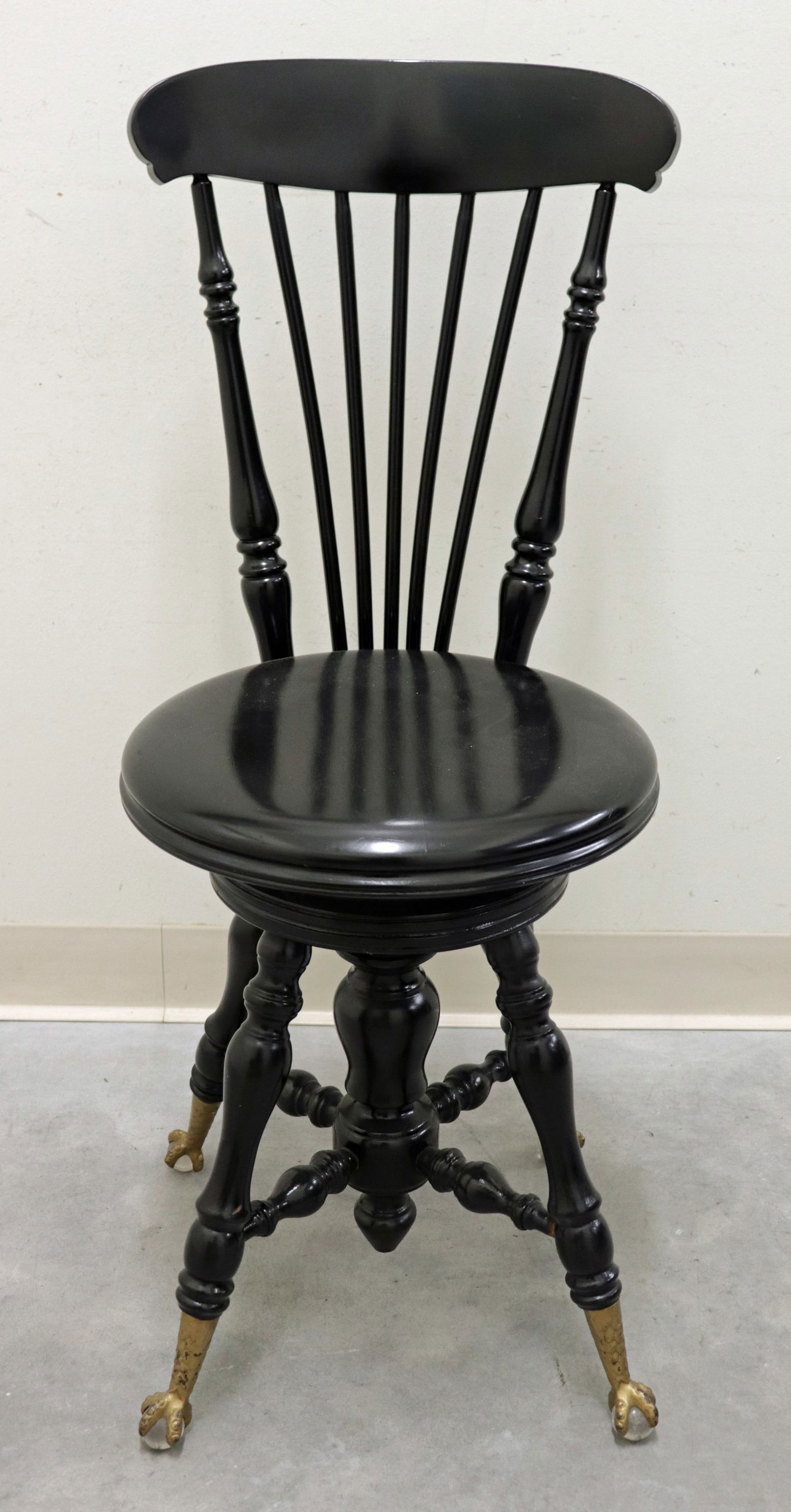 VICTORIAN PIANO CHAIR w/ GLASS BALL CLAW FEET: Antique black painted piano chair with claw feet. Measures 34 3/4" x 14" x12"