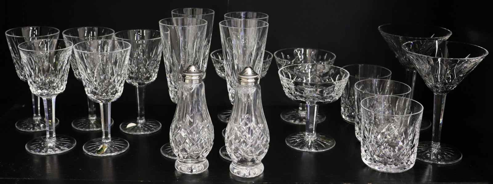(18) PIECE WATERFORD CRYSTAL COLLECTION: Collection of Waterford Crystal including (4) Lismore claret wine glasses 5 3/4" tall, (4) Lismore champagne flutes, (3) Lismore champagne / sherbet glasses, (3) Old Fashioned whiskey rocks cocktail g