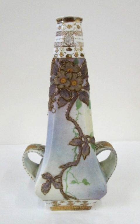 ANTIQUE NIPPON PORCELAIN CORALENE VASE: Hand painted with raised flower design. Unusual two handles towards bottom of vase. Marked US patent NBR 912171 Feb 9 1909 Japan. Some wear/paint loss as expected. Crack/repair to one handle. 10 1/2" 